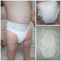 Подгузники-трусы и памперсы детские фотография